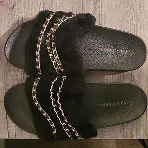 Black furry slides with chain links